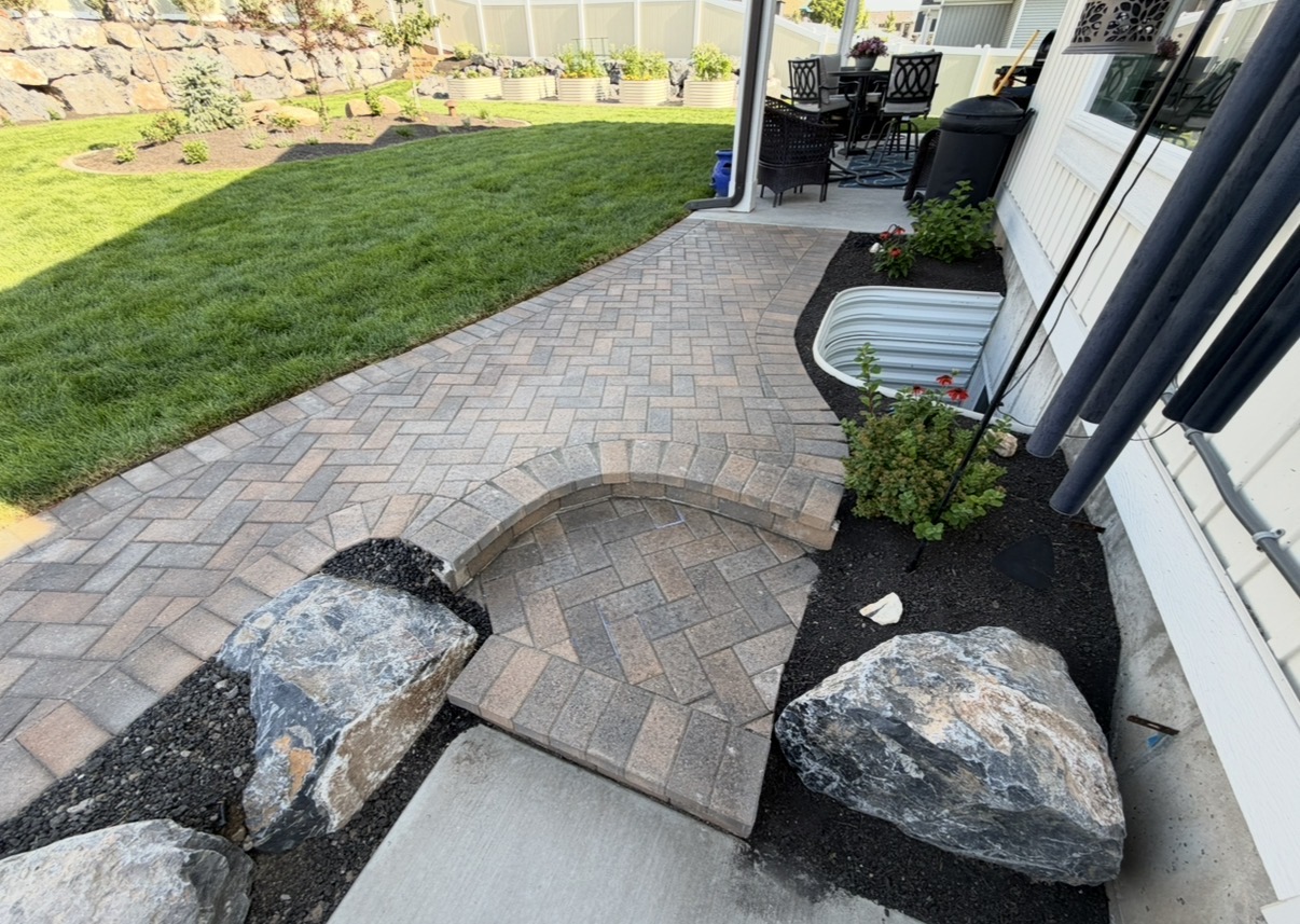 Custom curved paver entry and landscape detail